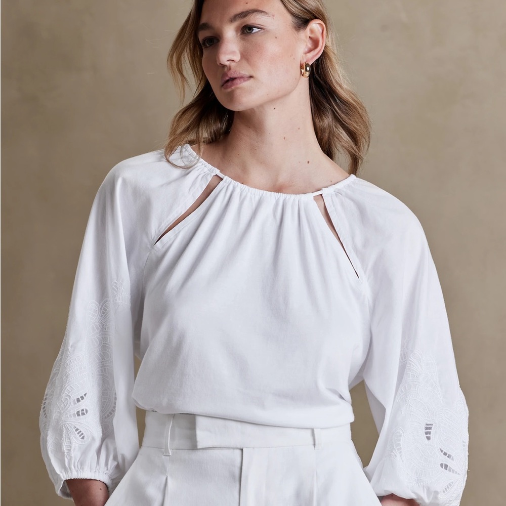 Banana Republic white blouse with cutouts & embroidered puff sleeves